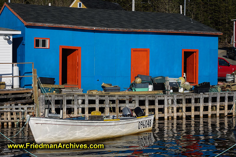 fishing,twillingate,newfoundland,canada,village,boat,boathouse,boat house,pillars,water,good light,